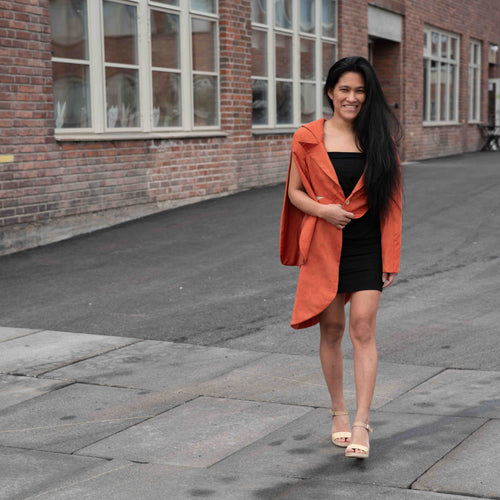 A sculptural suade dress by MYET