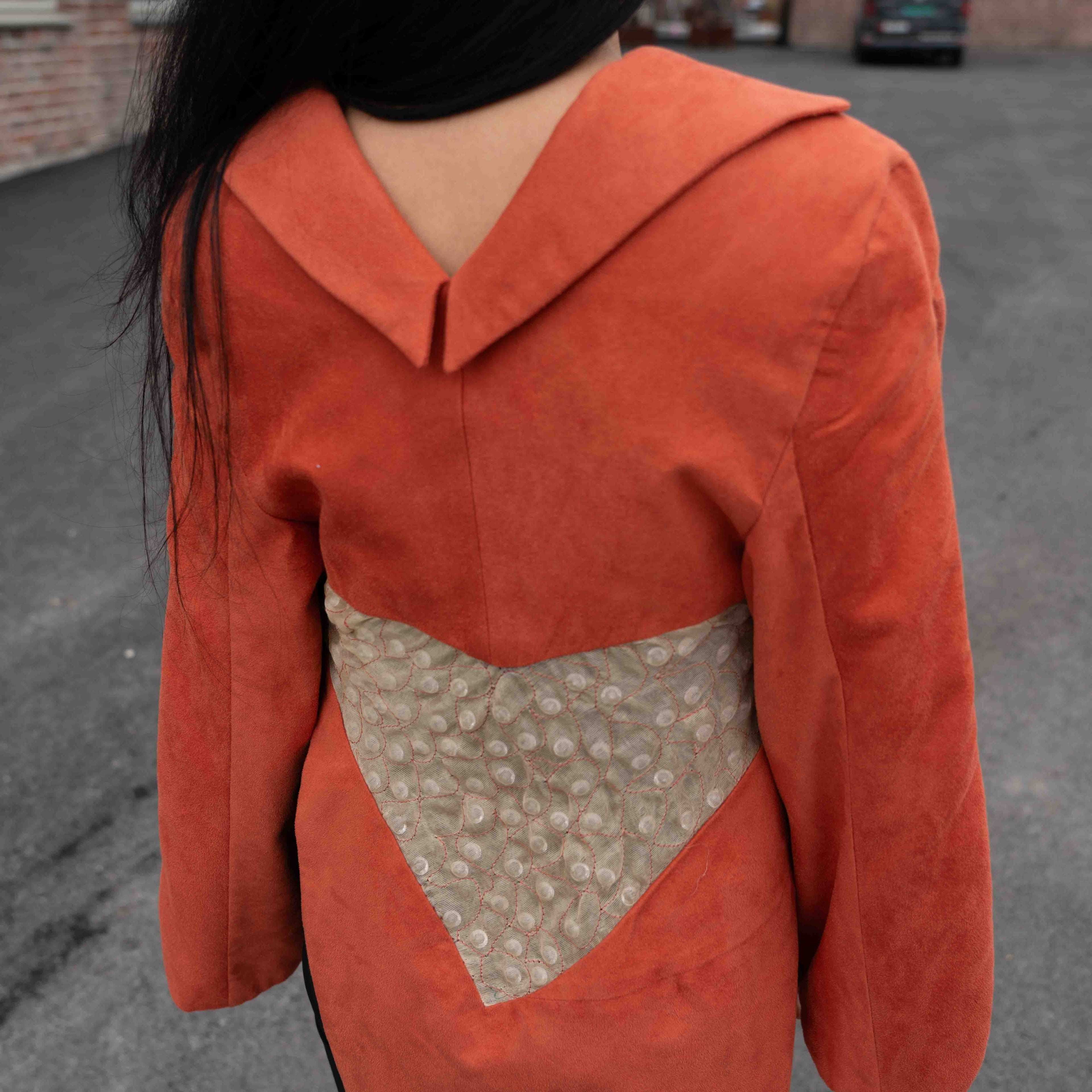 A sculptural suade dress by MYET