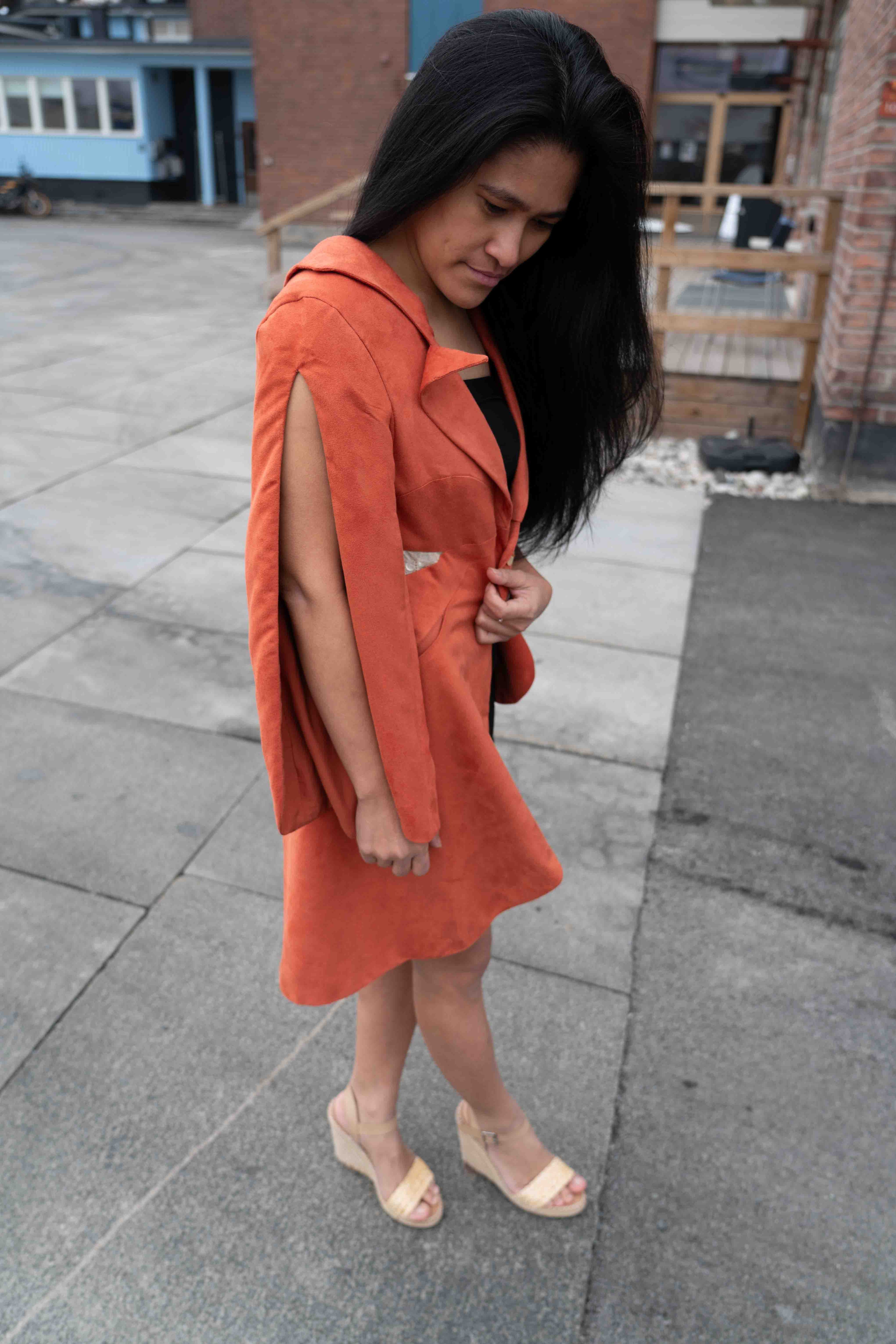 A sculptural suade dress by MYET